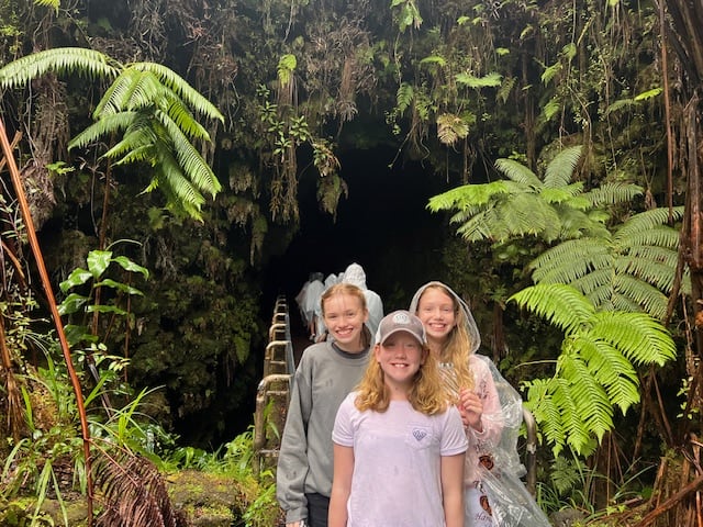 Kids in from of the entrance to the Thurston Lava tube in Volcanoes National Park 