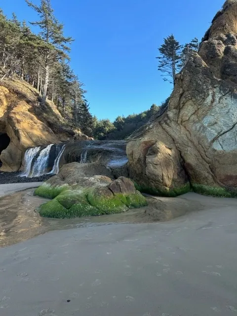 Waterfall at Hug Point State Recreation Site in Cannon Beach Oregon