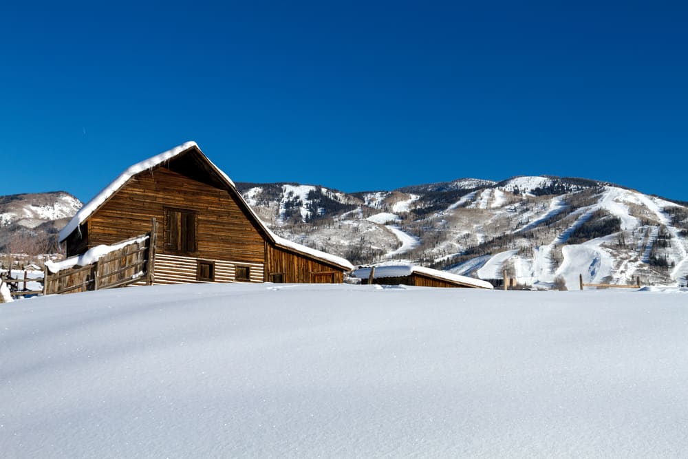 Barn with mountain in the background in Steamboat Springs, Colorado