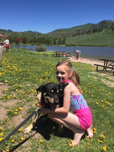 Girl with dog at Steamboat Lake Colorado