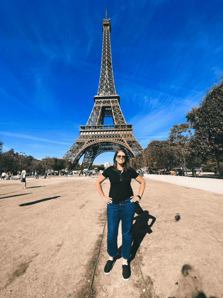 Posing in front of the Eiffel Tower