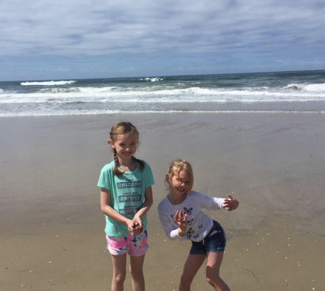 Kids posing on Mission Beach in San Diego,California