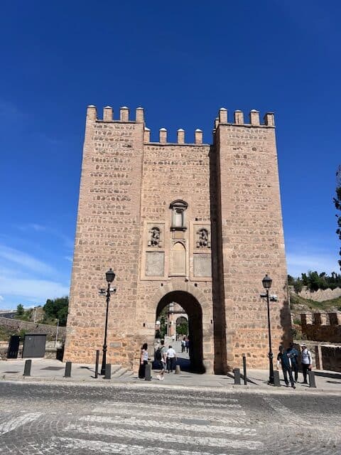 Tower in front of a bridge in Toledo, Spain
