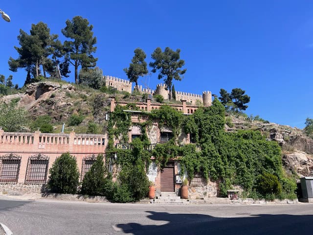 View of a castle on a hill in Toledo, Spain
