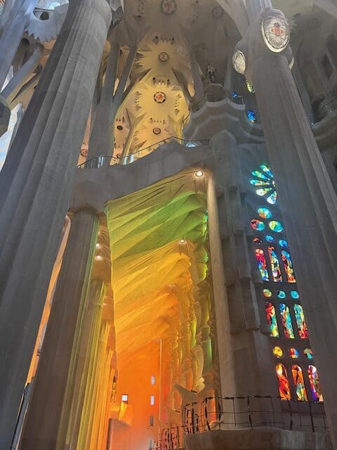 Light reflecting from the stained glass inside Sagrada Familia in Barcelona