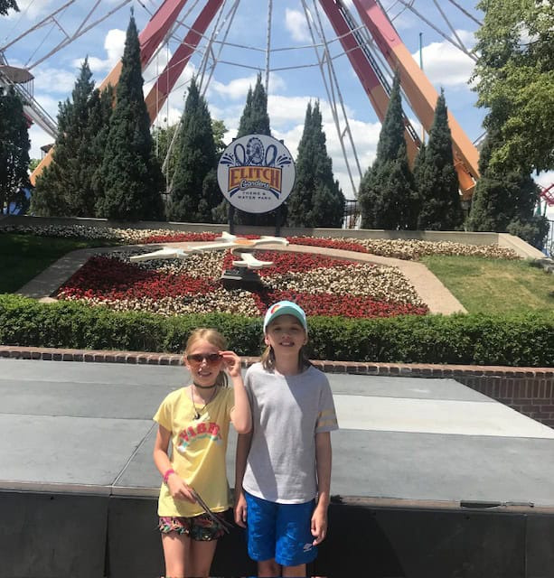 Standing in front of the Ferris Wheel at Elitch Gardens in Denver, Colorado