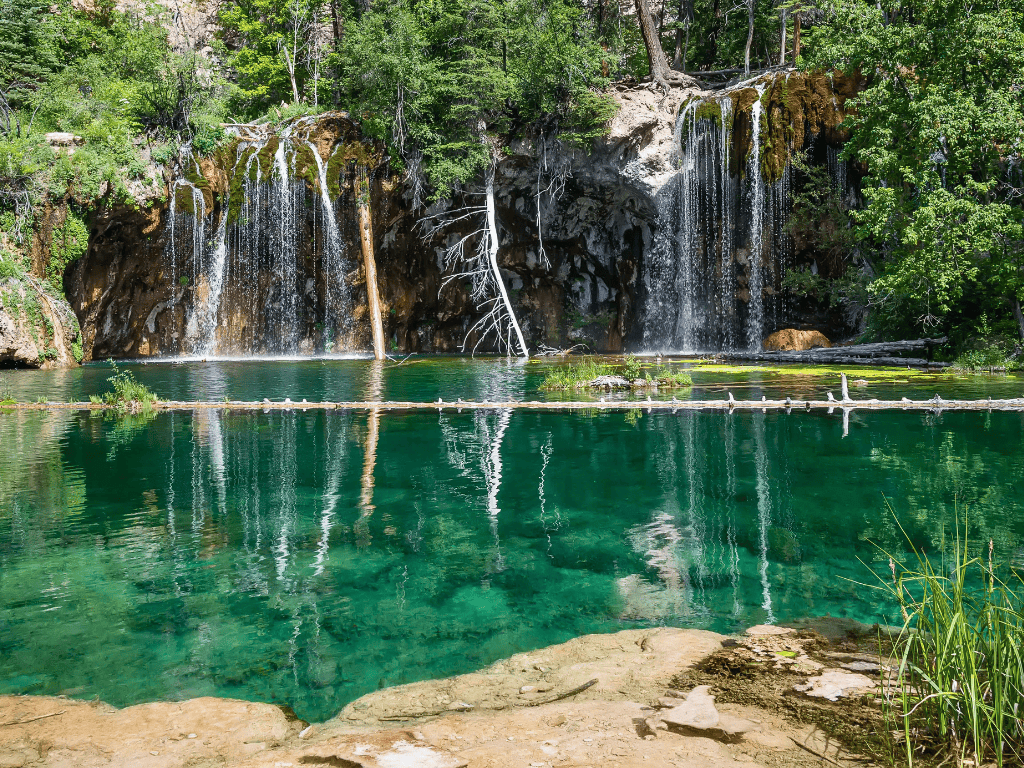 View of Hanging Lake with waterfalls and turquoise water in Glenwood Springs, Colorado