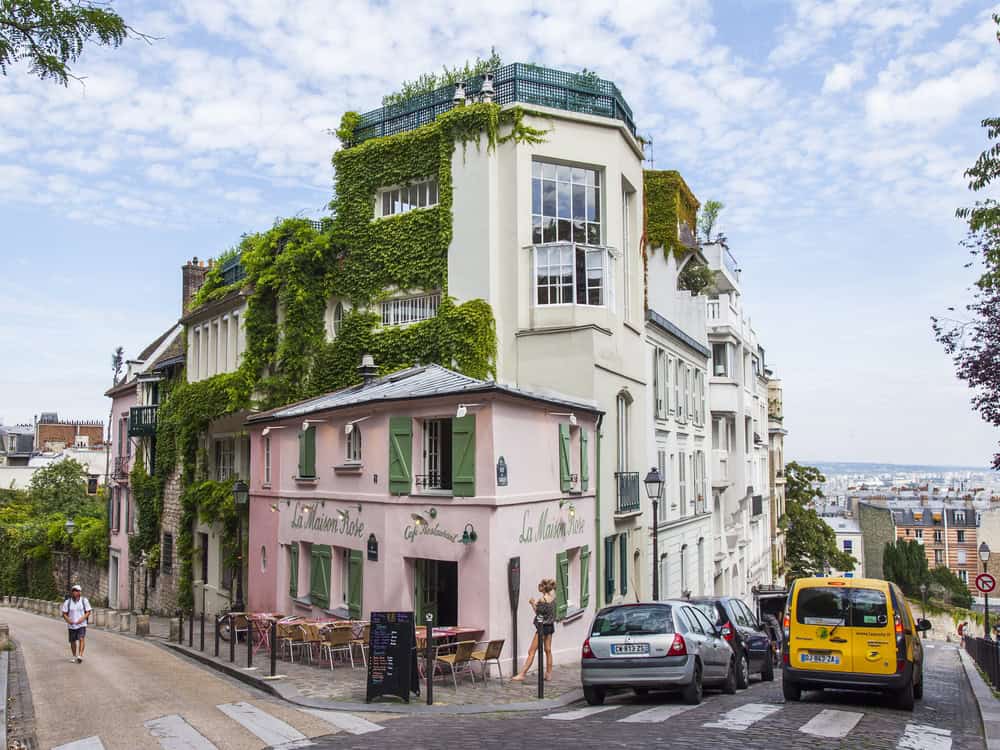 Pink corner building in the Montmartre neighborhood in Paris 